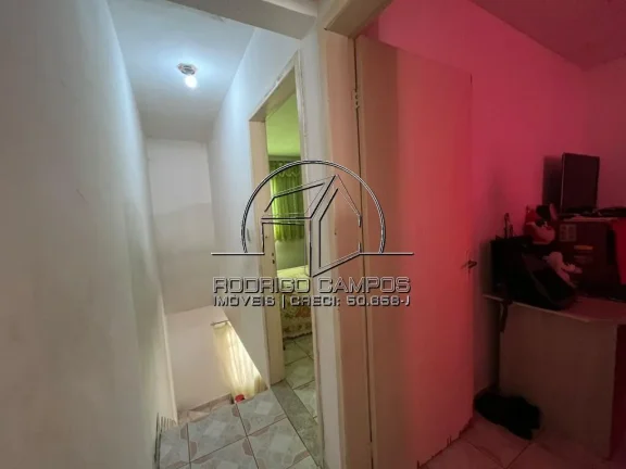 Imagem Sobrado Aconchegante à Venda em Nova Mirim, Praia Grande - 2 Quartos