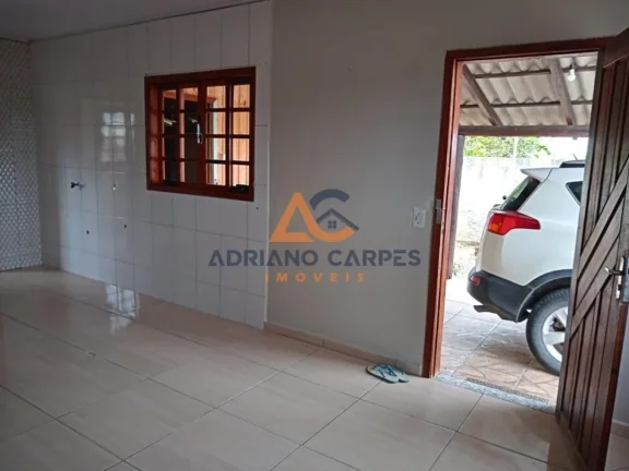 Imagem Casa com 2 dormitórios localizada no bairro Porto escalvados, em Navegantes - Adriano Carpes Imóveis Vende