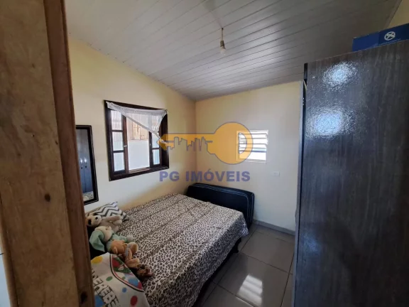 Imagem CASA COM AMPLO TERRENO, 3 DORMITÓRIOS NO BALNEÁRIO SHANGRILÁ