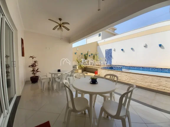 Imagem Lindo sobrado com 4 suítes, sendo uma master com jardim de inverno, outra no térreo, varanda. Espa...