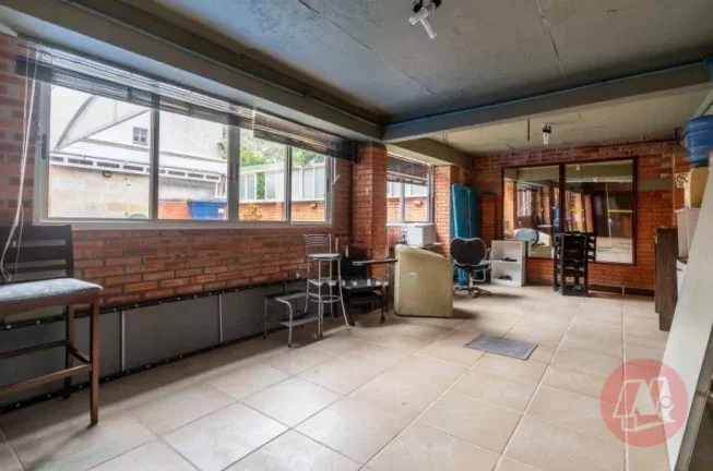 Imagem Casa com 3 dormitórios, 299 m² - venda por R$ 2.385.000,00 ou aluguel por R$ 23.499,00/mês - Boa Vista - Porto Alegre/RS