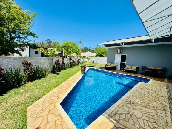 Imagem Casa com 4 suítes em condomínio em Porangaba - SP