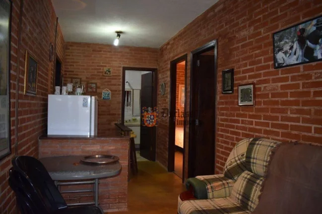 Imagem Casa com 3 dormitórios à venda, 280 m² por R$ 1.220.000 - Alto Do Capivari - Campos do Jordão/SP