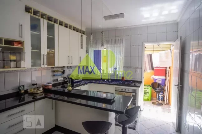 Imagem Casa em Condomínio de Alto Padrão na Vila Esperança, São Paulo-SP: 3 Quartos, 1 Suíte, 2 Vagas - 99m² de Luxo!