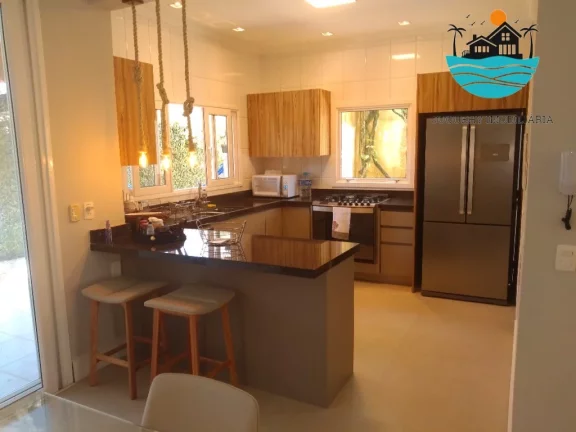 Imagem Casa em condomínio para locação em Juquehy com 4 suítes, Acomoda 12 pessoas a 150 metros da praia | Juquehy Imobiliária