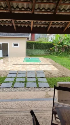 Imagem Casa em Condomínio para Venda em Ubatuba / SP no bairro Horto Florestal