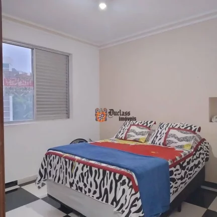 Imagem Apartamento com 2 dormitórios à venda, 63 m² por R$ 361.600 - Centro - São Vicente/SP