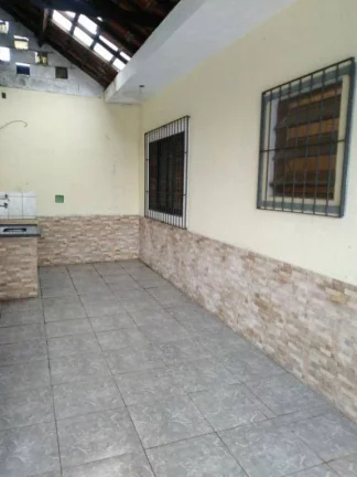 Imagem Casa com 2 dormitórios à venda, 90 m² por R$ 430.000,00 - Caiçara - Praia Grande/SP