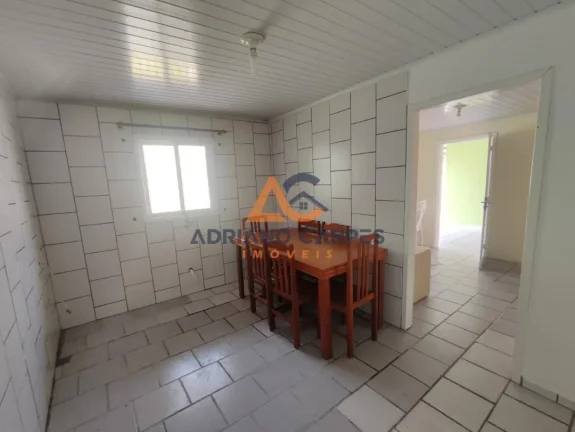 Imagem Casa com 4 quartos há 700 metros da praia no bairro Meia Praia em Navegantes a venda na Adriano Carpes Imóveis vende