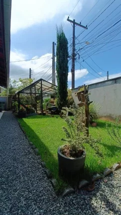 Imagem CASA DE ESQUINA COM 3 QUARTOS NO ITAUM