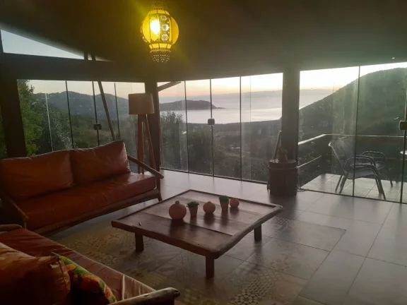 Imagem Casa à venda em Garopaba-SC, Praia da Silveira: 4 quartos, 2 salas, 2 banheiros, 3 vagas, 200m². Imperdível!