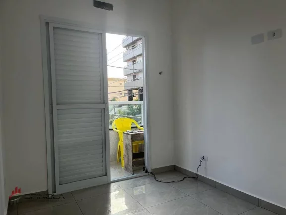 Imagem Sobrado com 2 dormitórios à venda, 117 m² por R$ 580.000,00 - Aviação - Praia Grande/SP