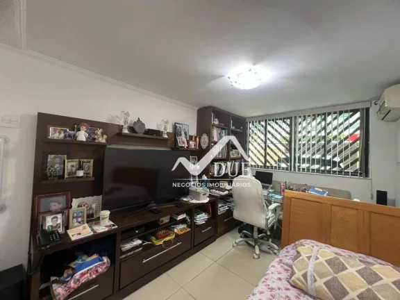Imagem Casa com 4 dormitórios à venda, 150 m² por R$ 1.590.000,00 - Gonzaga - Santos/SP