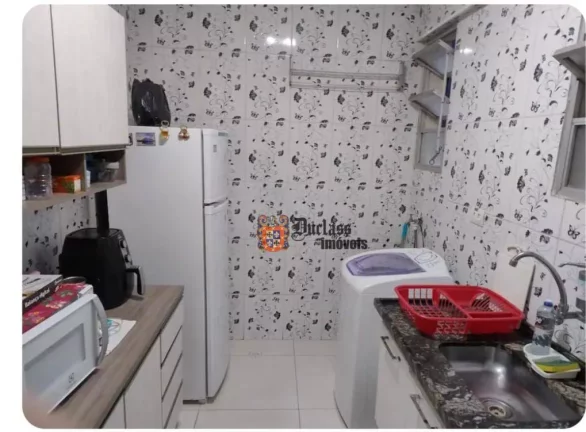 Imagem Apartamento com 2 dormitórios à venda, 63 m² por R$ 361.600 - Centro - São Vicente/SP