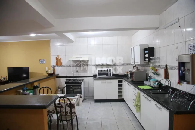 Imagem Venda em Samambaia Sul: Casa com 4 dormitórios, 1 suíte e 3 banheiros por R$ 400.000. Oportunidade imperdível!