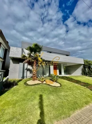 Imagem Casa térrea em condomínio fechado com 04 suites