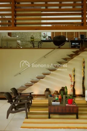 Imagem Casa com arquitetura diferenciada no condomínio Alphaville Campinas. A espaçosa residência possui...