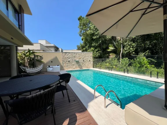 Imagem Casa de Luxo à Venda em Riviera de São Lourenço Módulo 24: 5 Quartos, 5 Suítes, 3 Salas, 6 Vagas de Garagem, 395,00m² de Área
