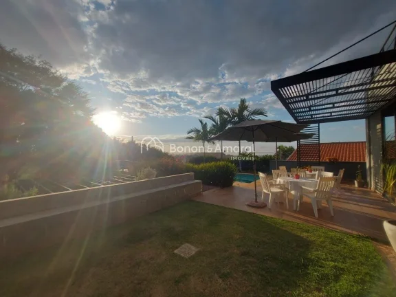 Imagem Encante-se com esta belíssima residência de 295,84m² de construção, projetada para oferecer con...