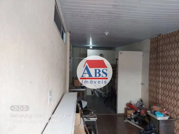 Imagem casa com duas lojas e uma edícula