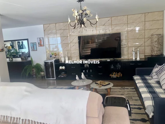 Imagem Casa Alto Padrão a venda em Condominio Fechado com 04 suítes e 03 vagas.