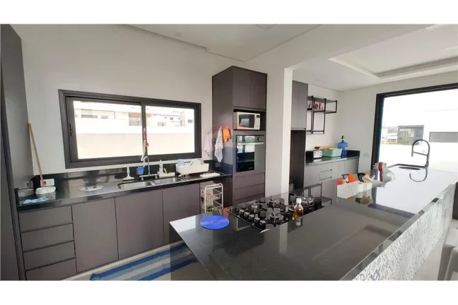 Imagem Casa a venda com 3 suítes, office independente e 3 vagas no condomínio Reserva Saint Paul em Itu.