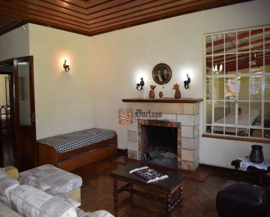 Imagem Casa com 3 dormitórios à venda, 270 m² por R$ 1.200.000 - Vila Abernéssia - Campos do Jordão/SP