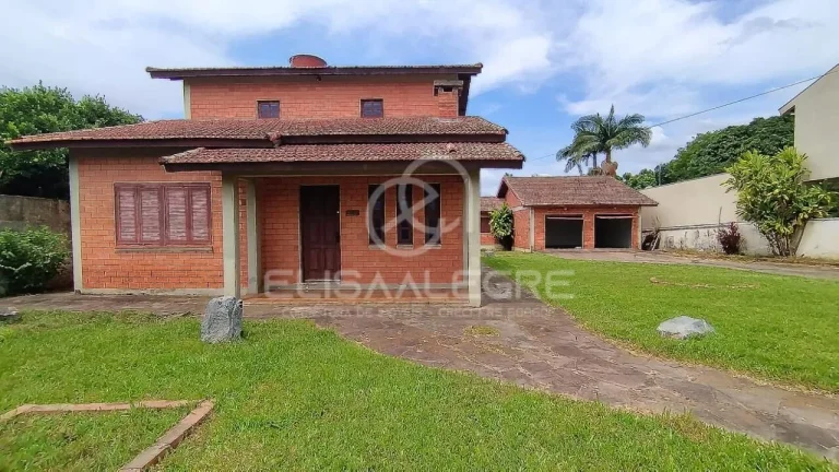 Imagem Sobrado + casa auxiliar em terreno de 1.864m² em Esteio