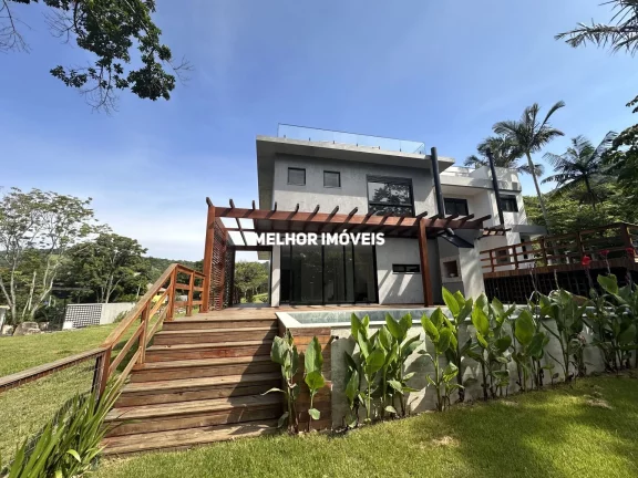Imagem Casa de Alvenaria nova com 3 suítes localizada na Praia de Taquaras em Balneário Camboriú - SC