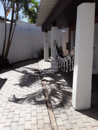 Imagem Imperdível casa à venda na Enseada, Guarujá-SP! 5 quartos, 3 suítes, 2 salas, 4 banheiros, 2 vagas de garagem. Confira!