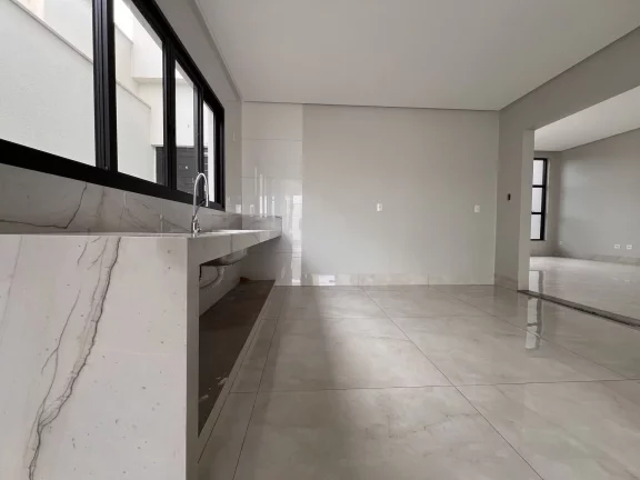 Imagem Casa Alto Padrão à Venda no Alto dos Caiçaras – 3 Suítes, Piscina e Área Gourmet em Patos de Minas
