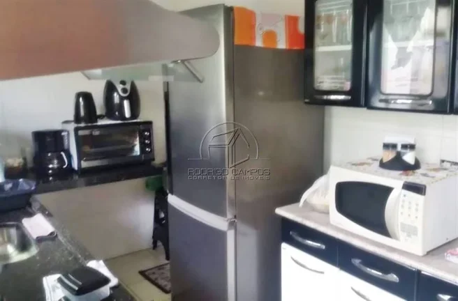 Imagem Casa Geminada à Venda em Tude Bastos, Praia Grande - 2 Quartos e Churrasqueira