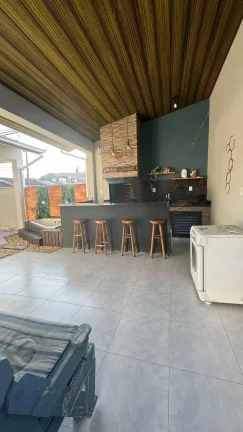 Imagem Geminado com 3 dormitórios e 4 vagas de garagem no bairro Parque Guarani em Joinville - SC
