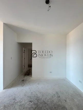 Imagem Apartamento de 2 dormitórios sendo 1 suíte, prédio frente mar no bairro Vila Mirim - Praia Grande