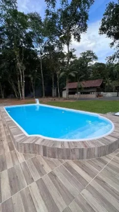 Imagem Chácara com casa de 3 dormitórios sendo 2 suítes e 8 vagas - Quiriri | Joinville/SC