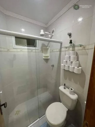 Imagem Sobrado com 3 dormitórios à venda, 125 m² por R$ 650.000 - Caiçara - Praia Grande/SP
