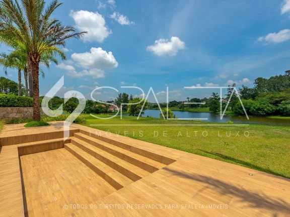Imagem Casa beira lago e totalmente mobiliada à venda no condomínio Fazenda Vila Real em Itu