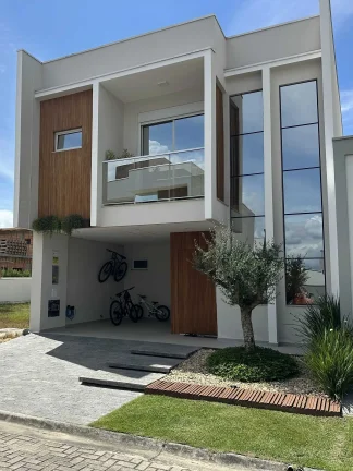 Imagem Casa com 3 dormitórios sendo 1 suíte e 2 vagas de garagem em Biguaçu/SC