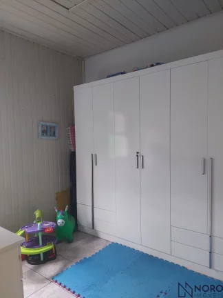 Imagem CASA MISTA COM 3 DORMITÓRIOS E 3 VAGAS DE GARAGEM NA MANOEL RIBAS