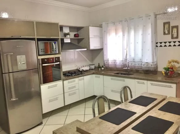 Imagem Casa térrea 3 dormitórios no bairro Tude Bastos