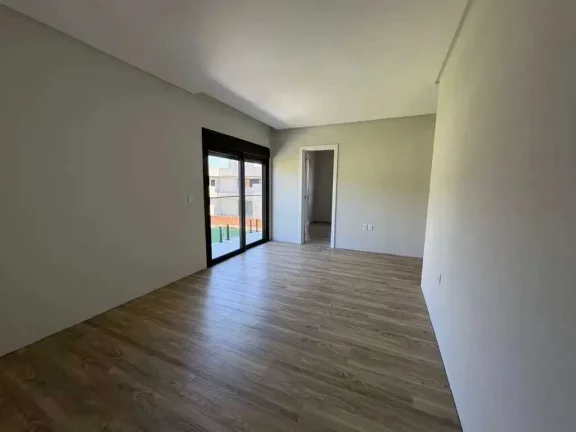 Imagem Casa alto padrão em condomínio com 4 suítes e 4 vagas de garagem em Camboriú/SC