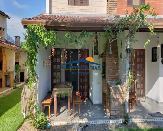 Imagem Casa em Condomínio com 2 dormitórios à venda, 177 m² por R$ 490.000 - Massaguaçu - Caraguatatuba/SP