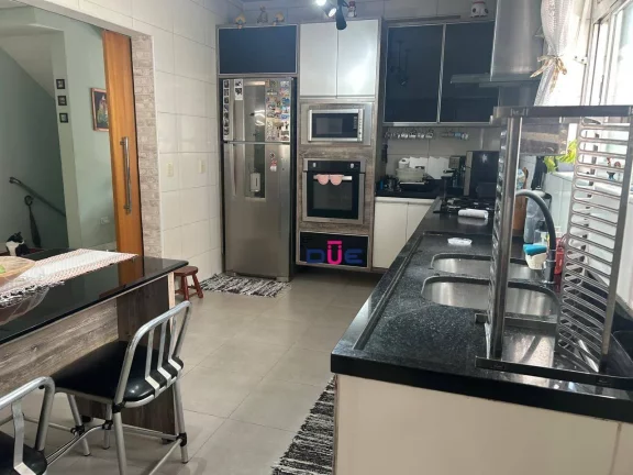 Imagem Sobreposta alta com 4 suítes, piscina e área gourmet à venda na Aparecida – Santos/SP