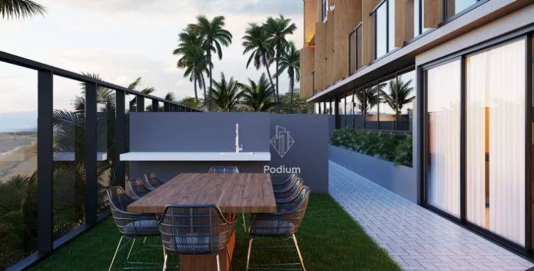 Imagem Apartamento térreo com área privativa pé na areia a beira mar da praia de Areia Dourada. -AP1569