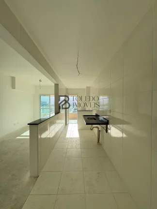 Imagem Apartamento de 2 dormitórios sendo 1 suíte, prédio frente mar no bairro Vila Mirim - Praia Grande