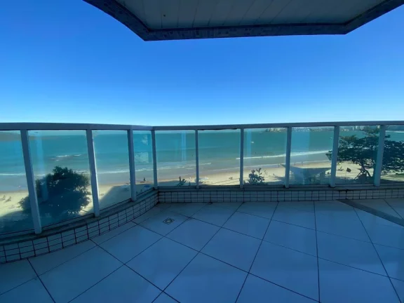 Imagem Em localização privilegiada da Praia do Morro de frente para o mar 3 quartos sendo duas suítes duas vagas de garagem