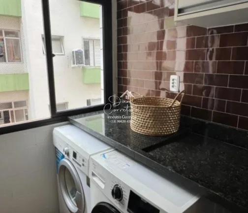 Imagem Aluguel de apartamento no Jardim Astúrias, Guarujá-SP: 2 quartos, 1 suíte, 2 salas, 2 banheiros, 1 vaga de garagem, 85m² de área.