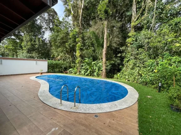 Imagem Imperdível Casa de Luxo à Venda em Riviera de São Lourenço Módulo 20: 4 Quartos, 4 Suítes, 2 Salas, 6 Vagas de Garagem!