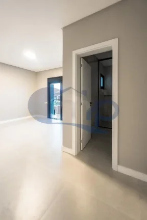 Imagem Casa a venda com 3 dormitorios no Morada das Palmeiras em Torres/RS