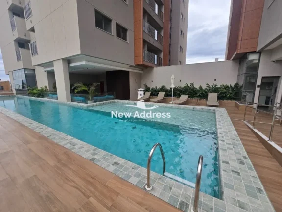 Imagem 2 quartos com suíte em prédio novo e acabamento moderno. Localização excelente, próximo à praia e comércio.